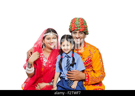 3 indian Rajasthani Villager Parents and daughter Student Stock Photo