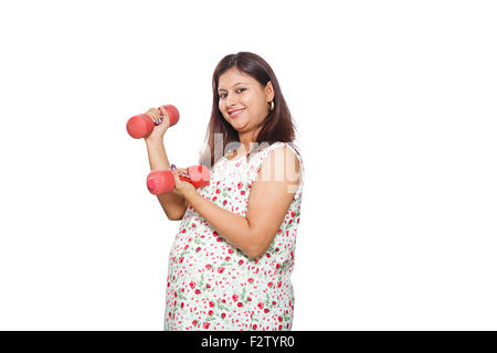 1 indian Adult Woman Pregnant Hand Weights Exercising Stock Photo
