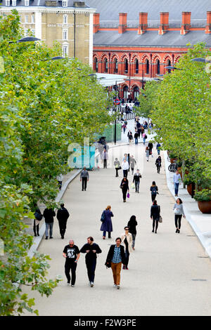 London, England, UK. Kings Boulevard, leading from Kings Cross Station to the Regent's Canal. St Pancras station visible ahead Stock Photo