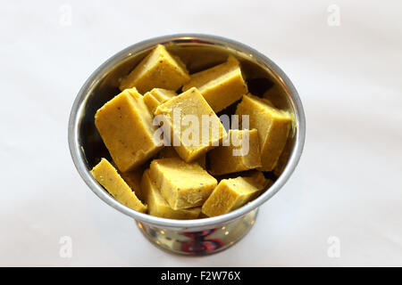 A bowl of Pistachio kulfi on a table Stock Photo