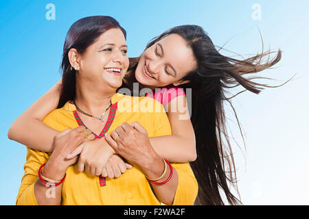 2 indian mother and young daughter enjoy Stock Photo