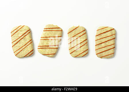 four white chocolate biscuits on white background Stock Photo