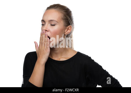 Beautiful woman yawns of boredom Stock Photo