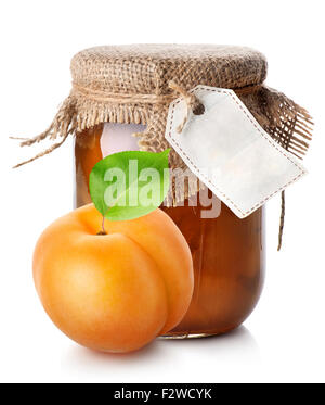 Apricot and jam in a jar isolated on white Stock Photo