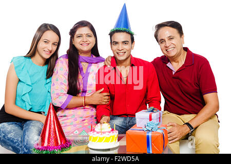 4 indian Presents young daughter and son Birthday Celebration Stock Photo