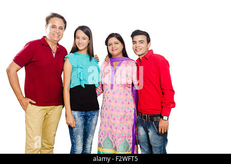 4 indian family Parents young daughter and son standing Stock Photo