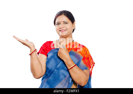 1 indian Adult Woman Housewife hand gesturing showing finger pointing Stock Photo