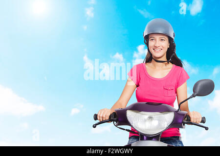 1 indian Young Woman Scooty Riding  enjoy Stock Photo