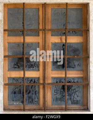 an old window with the metal bars Stock Photo