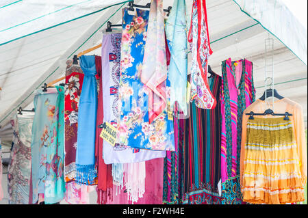 Shawl for women on sale at outdoor market. Italy Stock Photo