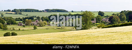 A panoramic view of the Cotswold village of Asthall, Oxfordshire UK  in the valley of the River Windrush Stock Photo