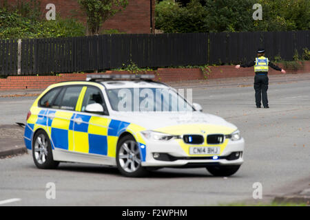 A police roadblock in place after a road traffic accident. Stock Photo