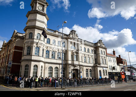 International students queue to register with OVRO - Overseas Visitors Records Office Stock Photo