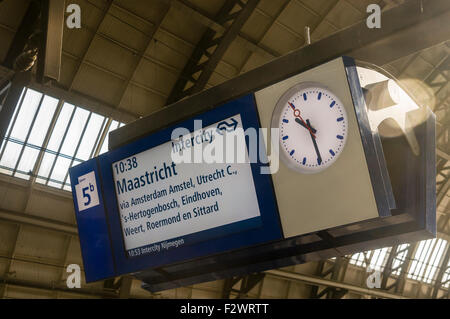 Sign for a train to Maastricht at Amsterdam Centraal Station. Stock Photo