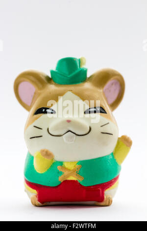 Japanese plastic Anime Hamtaro hamster cartoon character, Howdy, from the Ham-Ham gang. Anime figure against white background. Stock Photo