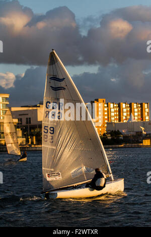 Southport, Merseyside, UK 24th September, 2015. UK Weather. Good evening sailing conditions on Marine Lake at dusk, with  GP 14 yacht crew taking advantage of the blustery conditions. Stock Photo