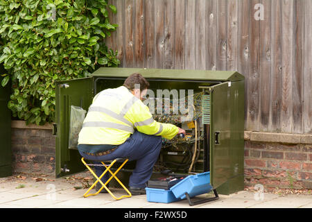 British Telecom Openreach engineer fixing electrical error in Bedford, Bedfordshire, England