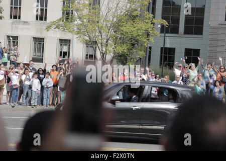 Washington, DC, USA. 24th Sep, 2015. People wave at Pope Francis as he departs the U.S. Capitol Building, Washington, DC, Sept. 24, 2015.The pope, 78, spoke to a joint session of the U.S. Congress, the first time for a pope. Credit:  Bill Putnam/ZUMA Wire/Alamy Live News Stock Photo