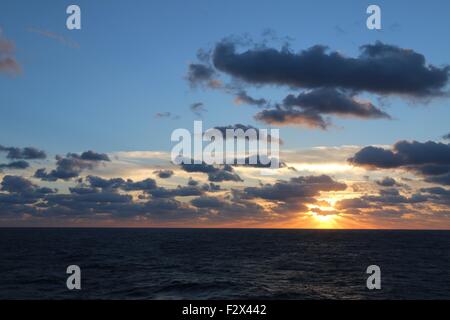 Dramatic sunset over the Atlantic Ocean. Stock Photo