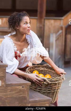 London, UK. 23/09/2015. Gugu Mbatha-Raw as Nell Gwynn. Photocall for the play/comedy Nell Gwynn by Jessica Swale at the Globe Theatre. Performances directed by Christopher Luscombe run from 19 September to 17 October 2015. With Gugu Mbatha-Raw (Nell Gwynn), Greg Haiste (Edward Kynaston), Jay Taylor (Charles Hart) and David Sturzaker (King Charles II). Stock Photo