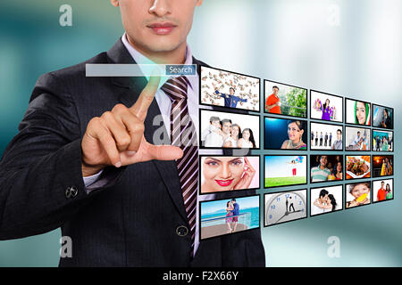 1 indian Business man Digitally Enhanced Computer Connection Stock Photo