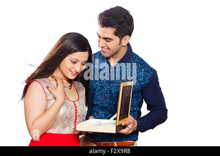 2 indian Married Couple Anniversary Surprise Gift Stock Photo