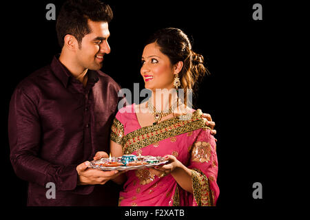 2 indian Married Couple  Diwali Festival Plate Diya Worship Stock Photo