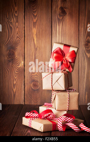 Christmas gift boxes on wooden table Stock Photo