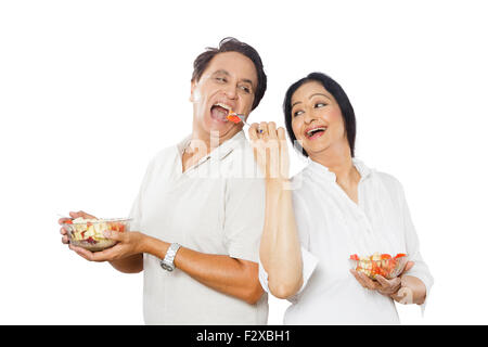 2 indian Adult Married Couple Dieting Eating Salad Stock Photo