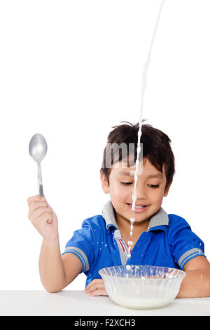 1 indian Kid boy Breakfast Drinking milk Breakfast Stock Photo