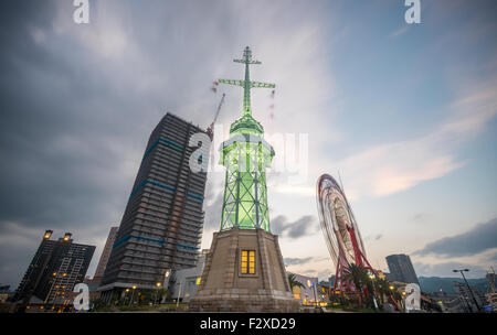 Ultra wide angle of lighthouse and buildings in Kobe, Japan Stock Photo