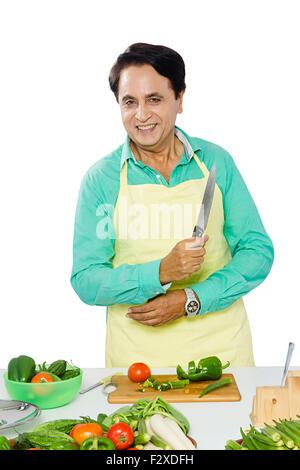 1 indian Adult man House Husband Kitchen Cooking Stock Photo