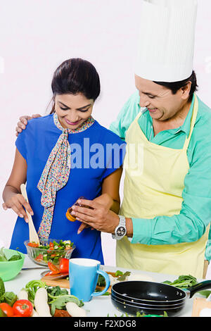 2 indian father and daughter Kitchen Cooking Stock Photo