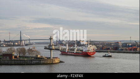 Container ship going under the Köhlbrand bridge, container port, Hamburg, Germany Stock Photo