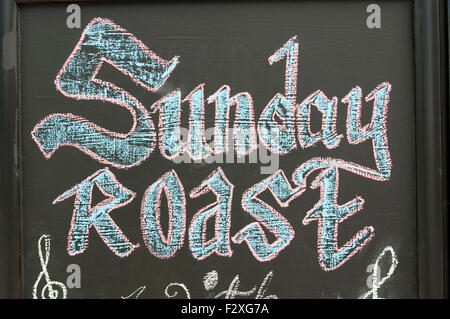 Sunday roast sign outside pub, High Street, Brentford, London Borough of Hounslow, Greater London, England, United Kingdom Stock Photo