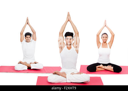 3 indian Friends Yoga Surya Namaskar Stock Photo