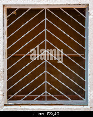an old window with the metal bars Stock Photo - Alamy