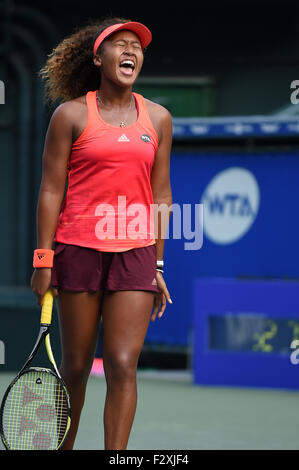 Naomi Osaka of Japan looks dejected during the match against Qinwen ...