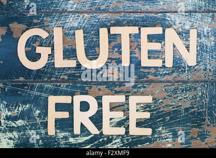 Gluten free written on rustic wooden surface Stock Photo