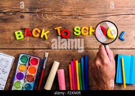 Gadgets and office supplies. Studio shot, wooden background. Stock Photo by  ©halfpoint 110784222