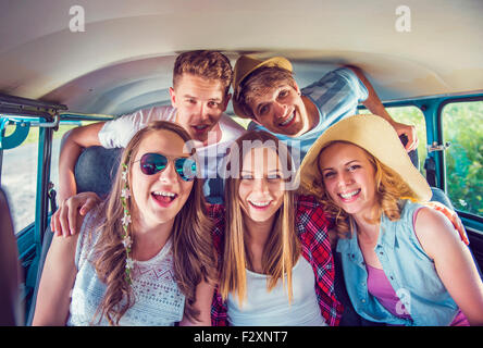Young hipster friends on a road trip on a summers day Stock Photo