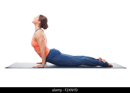 Sporty fit yogini woman practices yoga asana Urdhva mukha svanas Stock Photo