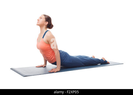 Sporty fit yogini woman practices yoga asana Urdhva mukha svanas Stock Photo