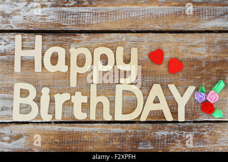 Happy birthday written with wooden letters on rustic wood Stock Photo