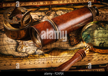 Old vintage compass on ancient map Stock Photo