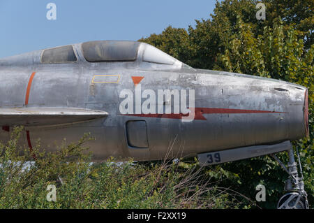 Old Mig fighter jet in the garden - Italy Stock Photo