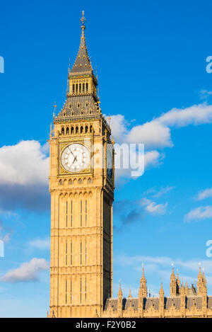 Big Ben clock tower  above the Palace of Westminster and houses of Parliament City of London England UK GB EU Europe Stock Photo