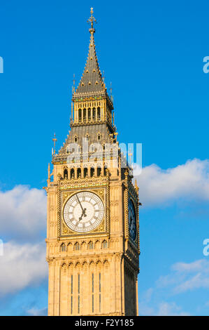 Big Ben clock tower  above the Palace of Westminster and houses of Parliament City of London England UK GB EU Europe Stock Photo