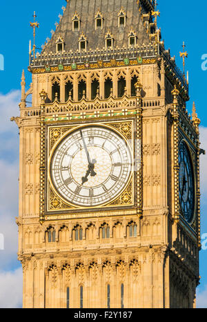 Big Ben clock tower  above the Palace of Westminster and houses of Parliament City of London England UK GB EU Europe Stock Photo