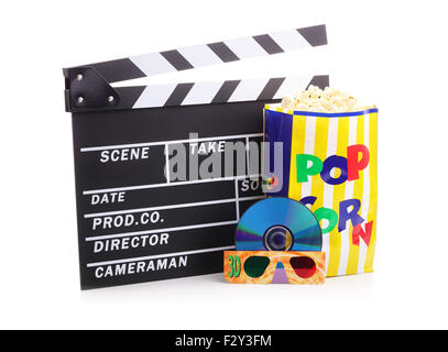 Movie clapper board, box of popcorn and a DVD disc with 3d glasses Stock Photo